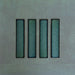 Group of Chemistry Green 6.5cm x 30cm rectangular ceramic wall tiles, showcasing a glossy crackle-effect glaze in rich green tones with an artisan, handcrafted effect finish.