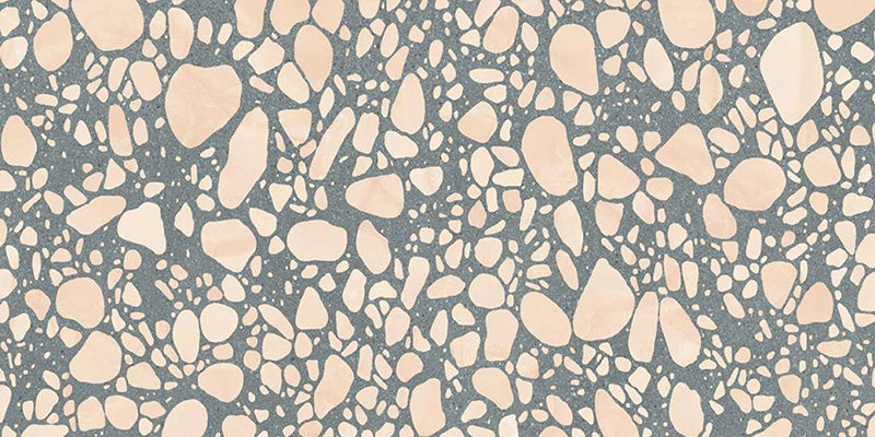 Close-up of Chunks POP Terrazzo Green 60 × 120cm terrazzo-effect porcelain tiles, featuring a muted green base with oversized blush pink and cream aggregate detailing for a playful contemporary finish.