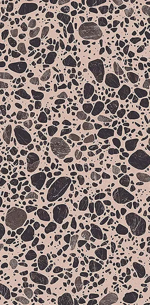Close-up of Chunks Pop Pink 60cm x 120cm terrazzo effect porcelain tile, featuring a soft pink background with black and grey stone-inspired aggregates for contemporary wall and floor designs.