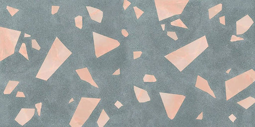 Close-up of Chunks ROCK Terrazzo Green 60 × 120cm terrazzo-effect porcelain tiles, featuring a muted green base with oversized blush pink terrazzo fragments for a bold, contemporary statement surface.