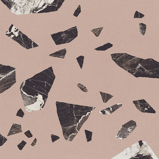Close-up of Chunks ROCK Terrazzo Pink 60 × 60cm terrazzo-effect porcelain tiles, featuring a soft blush pink base with oversized black and white marble-inspired fragments for a bold graphic finish.