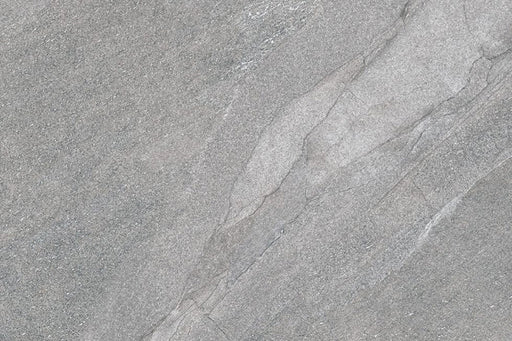 Flat lay of Cocoon Stone Silver 2cm 60 × 90cm porcelain tile, highlighting cool silver-grey stone effect tones with gentle veining and a fine, lightly textured surface. Subtle variation creates a clean, contemporary finish suitable for indoor and outdoor spaces.