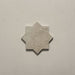 Close-up of a single Dohar Sands Star porcelain wall and floor tile, showcasing the distinctive eight-point star shape, warm sandy beige tone, speckled surface detail and subtle matt finish.