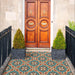 Entrance doorway featuring Europa Helsinki 20x20cm Victorian Moroccan style floor tiles in teal, terracotta and cream tones, installed in a decorative porch setting with wooden doors, stone walls and potted plants.