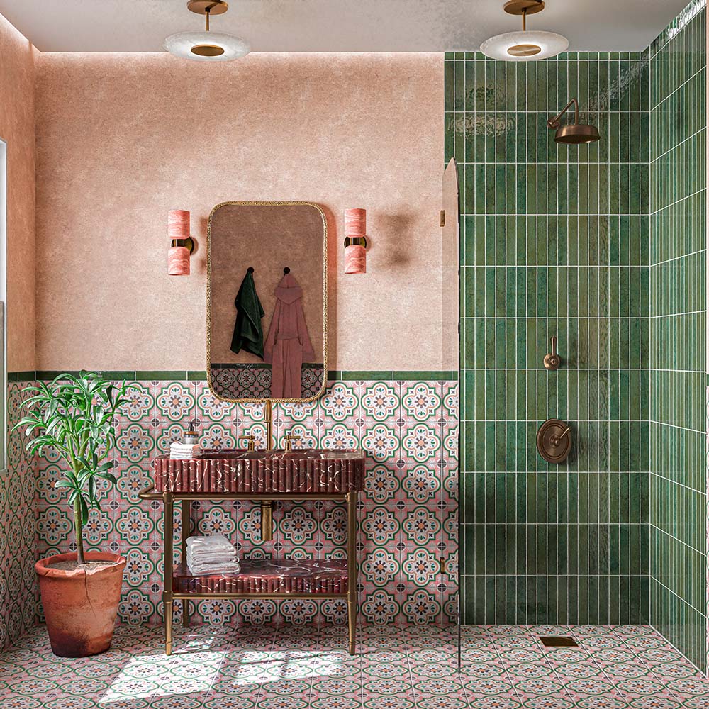 Bathroom featuring Elazar Forest Green 5x25cm brick wall tiles, arranged vertically in a rich green shower design, paired with colourful Moroccan-style patterned floor tiles, textured pink walls and brass fixtures.