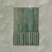 Product display of Elazar Decor Forest Green 12.5x25cm ceramic wall tiles in deep green tones, featuring a handcrafted glossy finish with coordinating fluted decorative tiles for textured contemporary interiors.