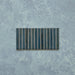 Product display of Elazar Decor Prussian 12.5x25cm ceramic wall tiles in deep blue tones, featuring a linear fluted design, handcrafted glossy finish and subtle tonal variation for textured contemporary interiors.