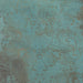 Close-up of Elements Oxide Patterns 30cm x 30cm metallic effect porcelain tile, featuring intricate etched geometric patterns in rich blue-green tones for contemporary statement wall and floor designs.