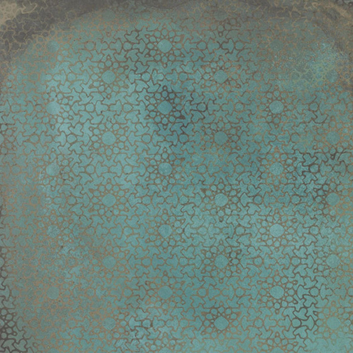 Close-up of Elements Oxide Patterns 60cm x 60cm metallic effect porcelain tile, featuring an etched Art Deco-inspired fan pattern in rich blue-green tones for contemporary statement wall and floor designs.