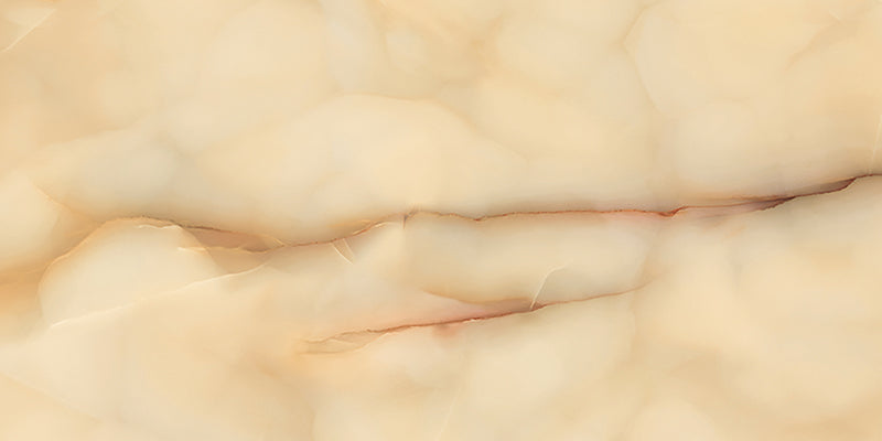 Close-up of Fantasia Miele Onyx Matt 60 × 120cm stone effect tile, featuring warm honey and cream tones with soft flowing veining, creating a natural, layered appearance with a smooth matt finish.