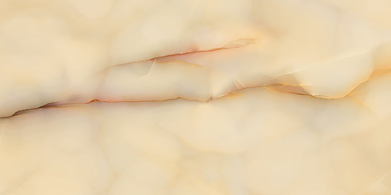 Close-up of Fantasia Miele Onyx Matt 60 × 120cm stone effect tile, featuring warm honey and cream tones with soft flowing veining, creating a natural, layered appearance with a smooth matt finish.