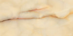 Close-up of Fantasia Miele Onyx Polished 60 × 120cm stone effect tile, featuring warm honey and cream tones with flowing gold and amber veining, creating a rich, layered pattern with a high-gloss polished finish.