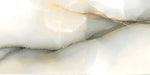 Close-up of Fantasia Pearl Onyx Polished 60 × 120cm stone effect tile, featuring soft cream tones with flowing grey and gold veining, creating a natural, layered pattern with a high-gloss polished finish.