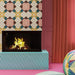 Geometry Contour patterned tiles in a 20x20cm size displayed in a fireplace setting, featuring mauve circular motifs, mustard and teal linear accents, and brown geometric framing, installed on a cream background alongside a modern fireplace with surrounding teal wave-pattern tiles and pink interior décor.