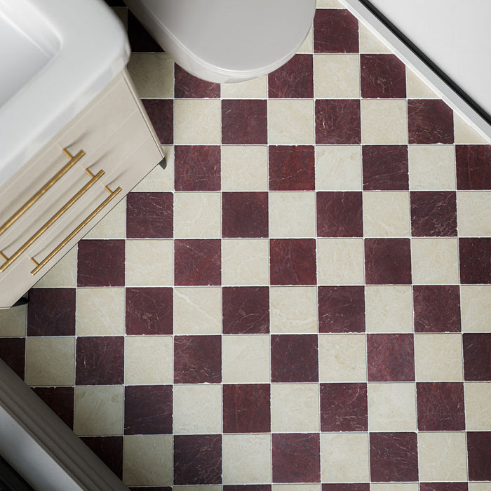 Fitzrovia Cappuccino 15.2cm x 15.2cm natural marble tiles with a tumbled finish, featuring warm cream and deep burgundy tones arranged in a classic chequerboard floor design.