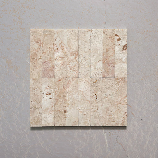 Group layout showcasing Fitzrovia Sylvester Pink 5cm x 20cm honed natural marble tiles, featuring soft pink, cream and beige tones with natural veining, creating an elegant and timeless wall tile design.