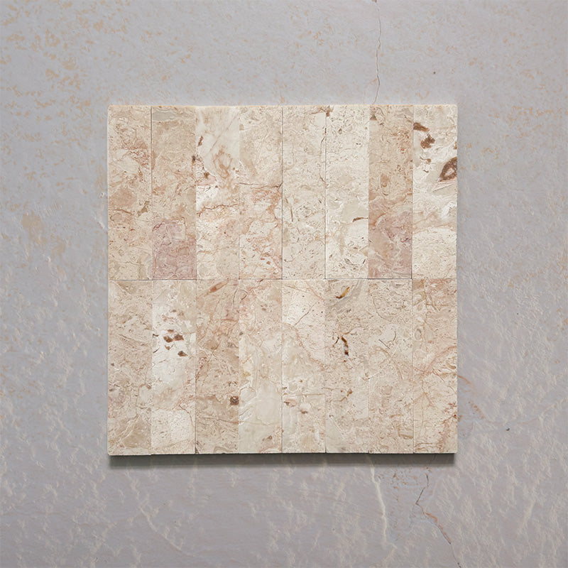 Group layout showcasing Fitzrovia Sylvester Pink 5cm x 20cm honed natural marble tiles, featuring soft pink, cream and beige tones with natural veining, creating an elegant and timeless wall tile design.