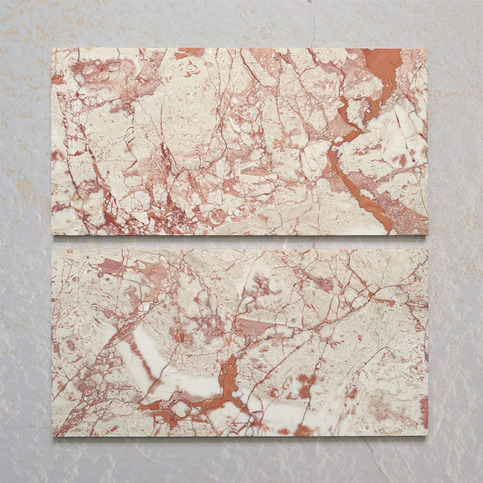 Group of two Fitzrovia Sylvester Pink honed natural marble tiles in a 30.5cm x 61cm format, showcasing natural variation with soft blush pink, cream and warm terracotta veining for a luxurious, timeless natural stone finish.
