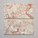 Group of two Fitzrovia Sylvester Pink honed natural marble tiles in a 30.5cm x 61cm format, showcasing natural variation with soft blush pink, cream and warm terracotta veining for a luxurious, timeless natural stone finish.