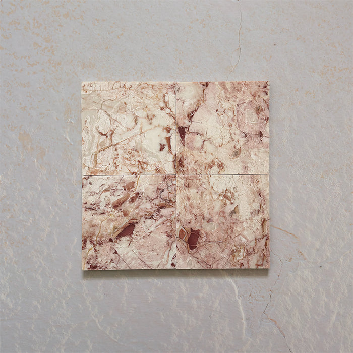 Fitzrovia Sylvester Pink honed natural marble tile in a 15.2cm x 15.2cm square format, featuring soft blush pink, cream and warm terracotta veining with natural variation for a luxurious, timeless natural stone finish.