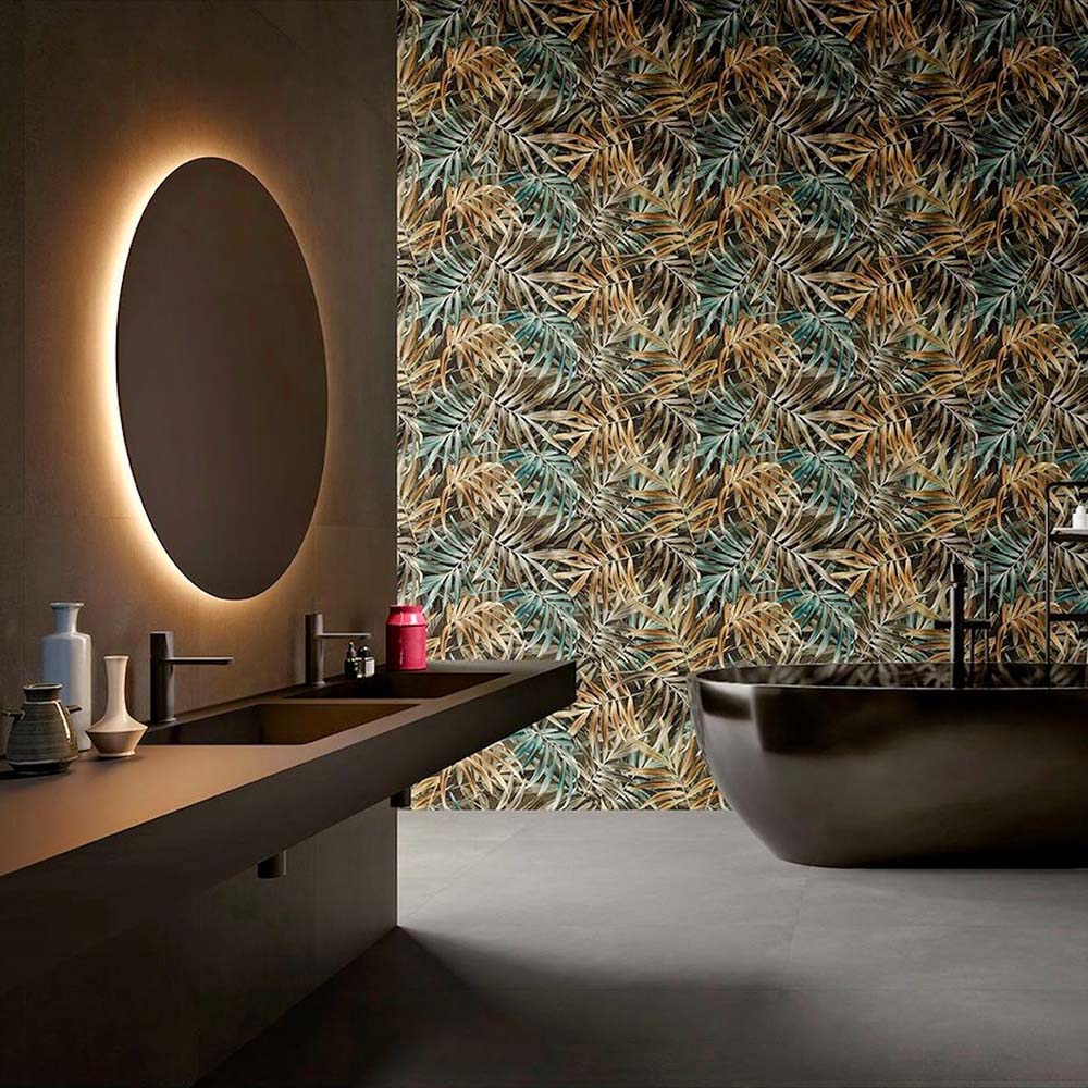Bathroom featuring Forest Decor Dark 60x120cm botanical-style wall tiles, showcasing a dramatic tropical leaf design in deep green, bronze and earthy tones, paired with a freestanding black bath, black vanity and contemporary fittings.