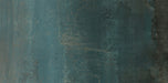 Close-up of Furnace Cuprum Oxide Metallic 60 × 120cm porcelain tile, showcasing deep blue-green tones layered with warm copper oxidation, soft tonal variation, and a gently textured metallic effect for a bold, industrial-inspired finish.