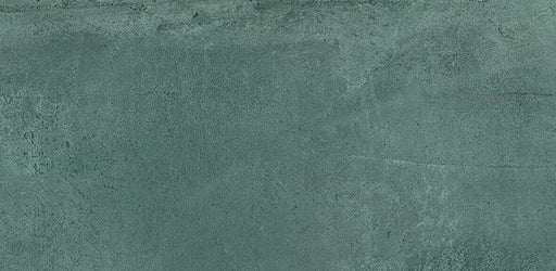 Close-up of Furnace Emerald Green Oxide Metallic 30 × 60cm porcelain tile, highlighting rich green tones with subtle tonal variation, a softly textured surface, and a refined metallic effect that adds depth and character to contemporary interiors.