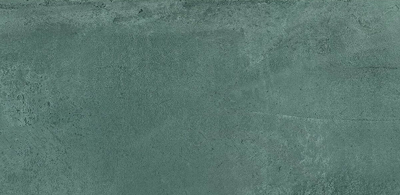 Close-up of Furnace Emerald Green Oxide Metallic 30 × 60cm porcelain tile, highlighting rich green tones with subtle tonal variation, a softly textured surface, and a refined metallic effect that adds depth and character to contemporary interiors.
