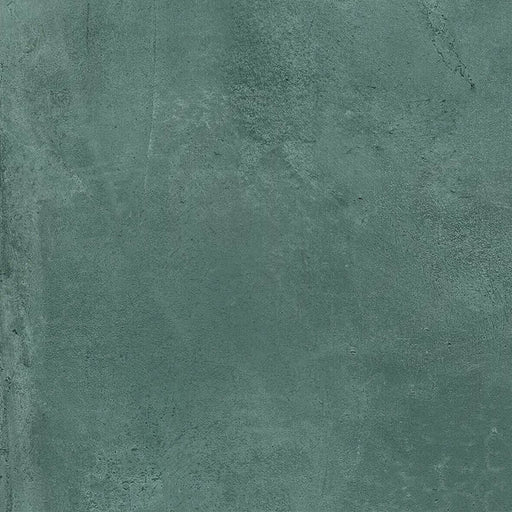 Close-up of Furnace Emerald Green Oxide Metallic 60 × 60cm porcelain tile, highlighting rich green tones with subtle tonal variation, a softly textured surface, and a refined metallic effect that adds depth and character to contemporary interiors.