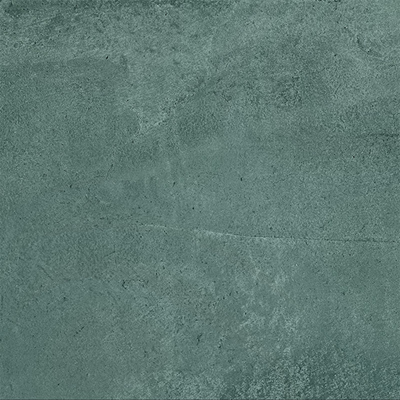 Close-up of Furnace Emerald Green Oxide Metallic 80 × 80cm porcelain tile, showcasing deep green tones with soft tonal variation, a gently textured surface, and a subtle metallic effect that brings depth and a contemporary, industrial-inspired finish to interior spaces.