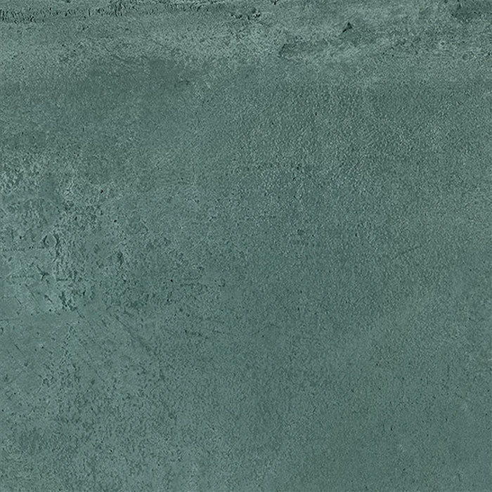Close-up of Furnace Emerald Green Oxide Metallic 80 × 80cm porcelain tile, showcasing deep green tones with soft tonal variation, a gently textured surface, and a subtle metallic effect that brings depth and a contemporary, industrial-inspired finish to interior spaces.
