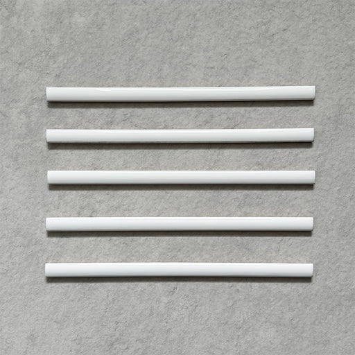 Fusion Arctic White 1.5x30cm gloss pencil bullnose border tiles featuring a clean bright white finish, designed for decorative edging and refined finishing details in contemporary wall tile installations.