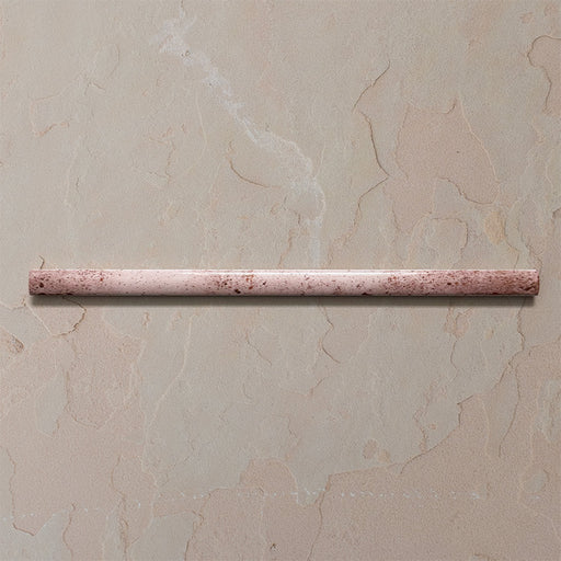 Fusion Coral Pink 1.5x30cm gloss pencil bullnose border tiles featuring soft blush and terracotta speckled tones, designed for decorative edging and refined finishing details in contemporary wall tile installations.
