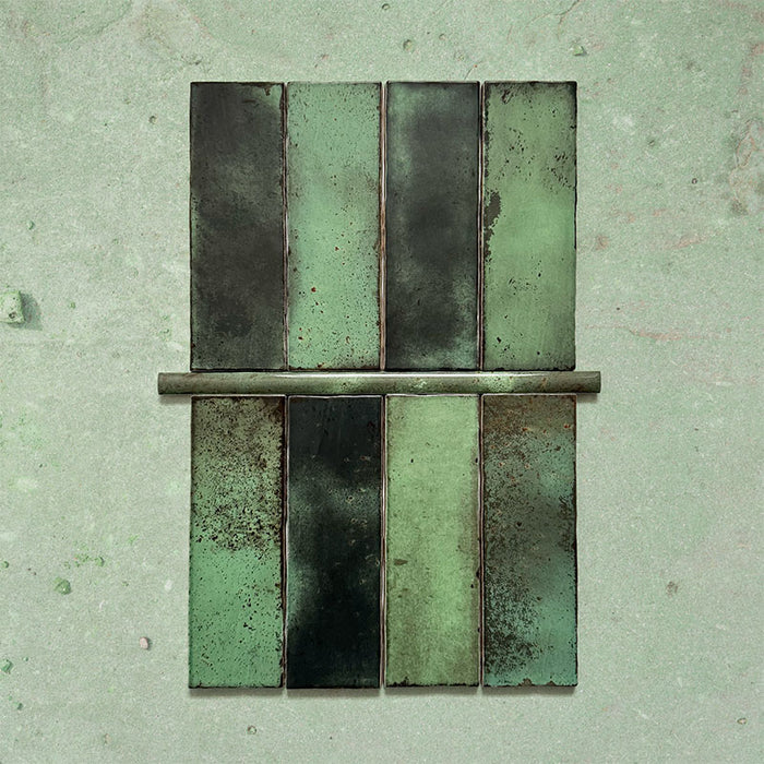 Fusion Jade Green 1.5x30cm gloss pencil bullnose border tiles featuring rich green and charcoal tonal variation, designed for decorative edging and refined finishing details in contemporary wall tile installations.