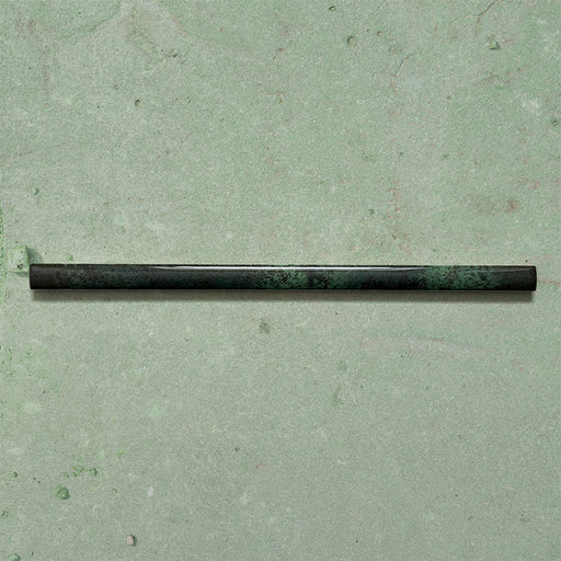 Fusion Jade Green 1.5x30cm gloss pencil bullnose border tiles featuring rich green and charcoal tonal variation, designed for decorative edging and refined finishing details in contemporary wall tile installations.