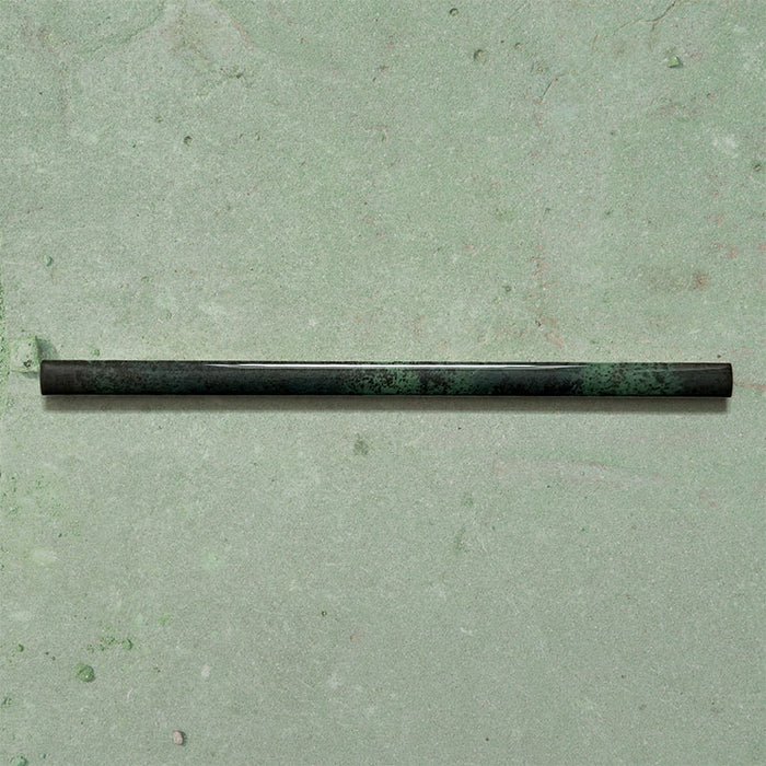 Fusion Jade Green 1.5x30cm gloss pencil bullnose border tiles featuring rich green and charcoal tonal variation, designed for decorative edging and refined finishing details in contemporary wall tile installations.