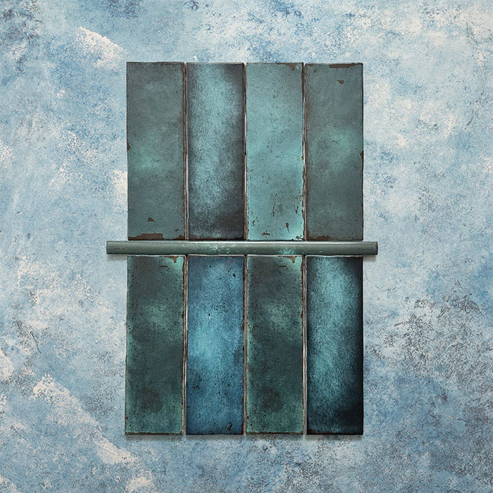 Fusion Marine Blue 1.5x30cm gloss pencil bullnose border tiles featuring deep navy and teal tonal variation, designed for decorative edging and refined finishing details in contemporary wall tile installations.