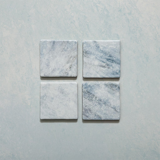 Product image of Giovanni Square Azul Vintage Marble wall and floor tiles in an 11cm x 11cm format, featuring soft blue and white marble effect detailing, subtle veining and rounded vintage-inspired edges.
