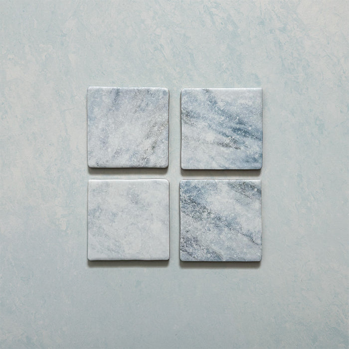 Product image of Giovanni Square Azul Vintage Marble wall and floor tiles in an 11cm x 11cm format, featuring soft blue and white marble effect detailing, subtle veining and rounded vintage-inspired edges.
