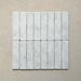 Product image of Giovanni Brick Carrara Vintage Marble wall and floor tiles in a 5.4cm x 22cm format, featuring a soft white marble effect surface with subtle tonal variation and rounded vintage-inspired edges.