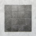 Product image of Giovanni Square Nero Vintage Marble wall and floor tiles in an 11cm x 11cm format, featuring a dark charcoal marble effect surface with subtle white veining and rounded vintage-inspired edges.
