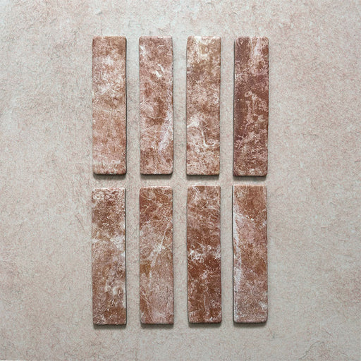 Product image of Giovanni Brick Rouge Vintage Marble wall and floor tiles in a 5.4cm x 22cm format, featuring warm blush pink marble effect detailing, natural tonal variation and rounded vintage-inspired edges.