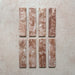 Product image of Giovanni Brick Rouge Vintage Marble wall and floor tiles in a 5.4cm x 22cm format, featuring warm blush pink marble effect detailing, natural tonal variation and rounded vintage-inspired edges.