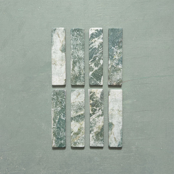 Product image of Giovanni Brick Salvia Vintage Marble wall and floor tiles in a 5.4cm x 22cm format, featuring green and white marble effect detailing, natural veining and rounded vintage-inspired edges.