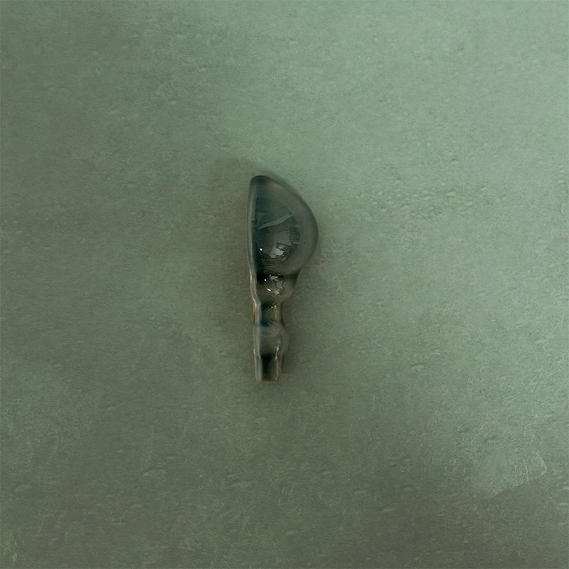 Detail view of Finchley Golders Green ceramic external corner trim with a crackle glaze finish, designed to create a smooth, decorative transition and a polished edge in classic wall tile installations.