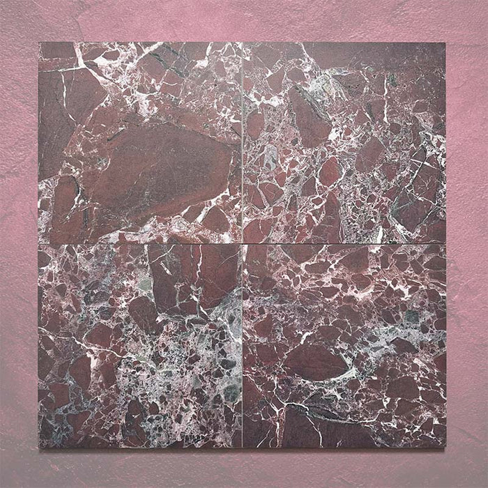 Close-up of Grand Bazaar Levant Rouge matt marble-effect tile in a 30cm x 30cm format, featuring deep burgundy and rich red tones with intricate white and grey marble-inspired veining. The dramatic colour variation and bold natural stone effect make it ideal for creating statement chequerboard floors and luxurious interior spaces.
