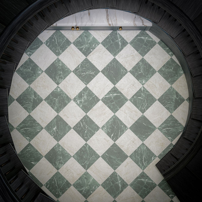 Interior featuring Grand Bazaar Mahal and Grand Bazaar Verde Green marble-effect chequerboard floor tiles, combining soft white and rich green tones in a timeless checkerboard design. Styled with dark navy cabinetry, brass detailing, marble worktops and a sweeping staircase, creating a sophisticated and elegant space that balances classic design with contemporary luxury.