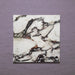 Close-up of Grand Bazaar Violetta matt marble-effect tile in a 30cm x 30cm format, featuring a white background with dramatic burgundy, plum and charcoal veining. The bold natural marble-inspired pattern creates a luxurious statement look, ideal for chequerboard floor designs and feature spaces.