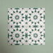 Group of Soukaina Green A Moroccan-style 20cm x 20cm patterned porcelain tiles, displaying a repeating geometric star motif in soft green, white and neutral tones with a matt finish.
