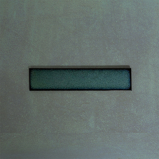 Single Chemistry Green 6.5cm x 30cm rectangular ceramic wall tile, featuring a glossy crackle-effect glaze in deep green tones with an artisan, handcrafted appearance.